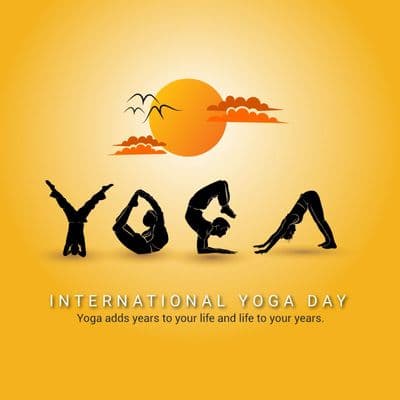 Man doing yoga asanas on mountain peak at dawn